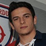 Э. Аслыйюксек