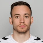 Э. Скогволл