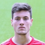 Р. Новакович  