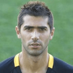 К. Мендринос  