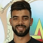 Х. Муджахид